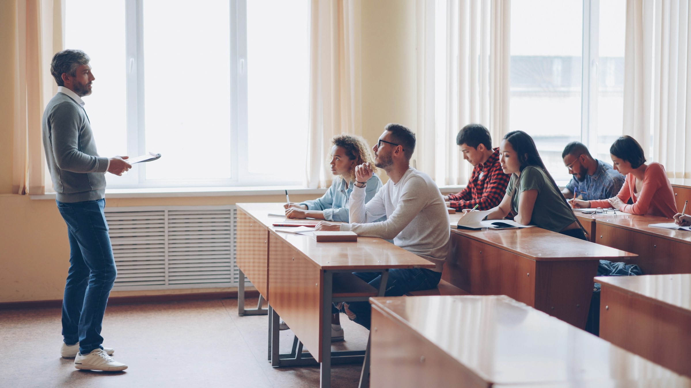 Professional school team working in a classroom